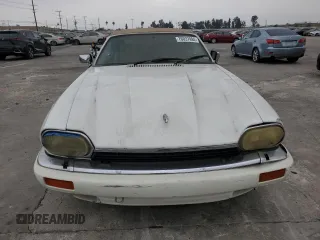 1994 Jaguar XJS with VIN SAJNX2749RC191243, listed as a Copart auction lot 76037994 with 74,842 mi miles and Salvage Title. Bid and sale history available at carsss.com. Image 5.