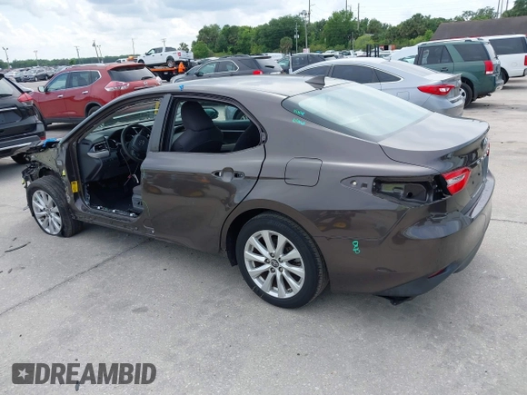 2019 Toyota Camry LE with VIN 4T1B11HKXKU818442, listed as a IAAI auction lot 41906128 with 30,728 mi miles and . Bid and sale history available at DreamBid. Image 3.