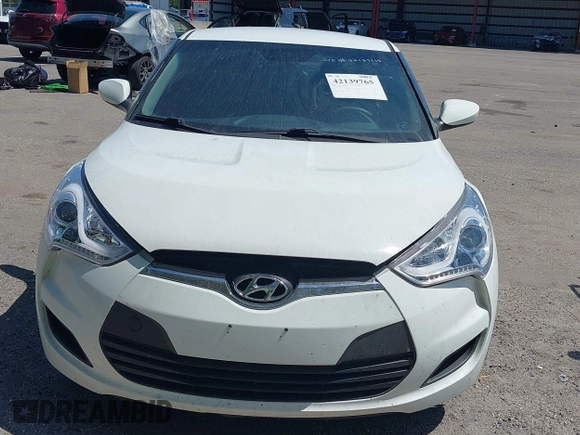 2016 Hyundai Veloster with VIN KMHTC6AD3GU270895, listed as a IAAI auction lot 42139765 with 138,884 mi miles. Bid and sale history available at carsss.com. Image 6.
