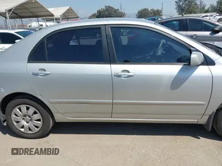 2004 Toyota Corolla CE with VIN 1NXBR32E14Z262676, listed as a IAAI auction lot 41992616 with 168,255 mi miles. Bid and sale history available at carsss.com. Image 13.
