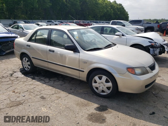 2003 Mazda Protege DX with VIN JM1BJ225X30107443, listed as a Copart auction lot 54777625 with 283,760 mi miles and Clean Title. Bid and sale history available at DreamBid. Image 4.