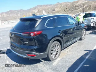 2017 Mazda CX-9 Grand Touring with VIN JM3TCBDY0H0130671, listed as a IAAI auction lot 42514237 with 81,016 mi miles and . Bid and sale history available at DreamBid. Image 4.