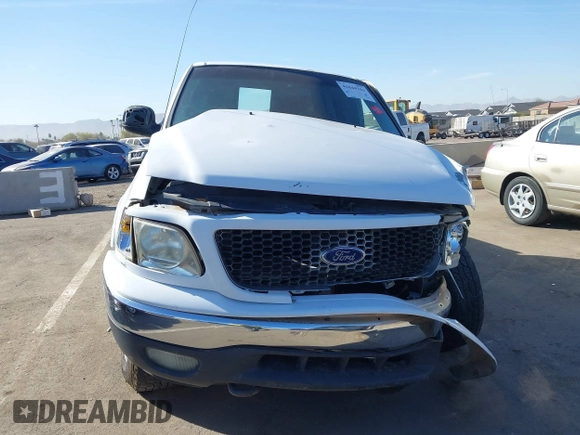 1999 Ford F-150 XL с VIN 1FTRX18L0XKB29703, выставлен на аукционе IAAI как лот 41644163 с пробегом Не указан миль и . История ставок и продаж доступна на DreamBid. Изображение 12.