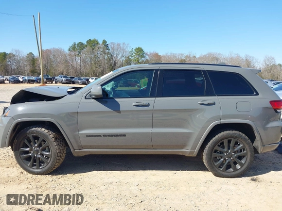2019 Jeep Grand Cherokee Laredo E with VIN 1C4RJFAG2KC855108, listed as a IAAI auction lot 41780277 with 81,283 mi miles and . Bid and sale history available at DreamBid. Image 15.
