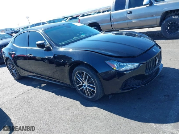 2015 Maserati Ghibli with VIN ZAM57XSAXF1146095, listed as a IAAI auction lot 41637782 with 102,152 mi miles. Bid and sale history available at carsss.com. Image 1.