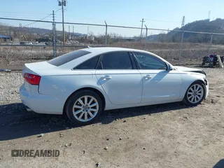 2015 Audi A6 Premium Plus z VIN WAUGFAFC4FN016103, wystawiony jako IAAI lot #41774479 z przebiegiem 125 412 mil mil oraz . Historia ofert i sprzedaży dostępna na DreamBid. Obrazek 14.
