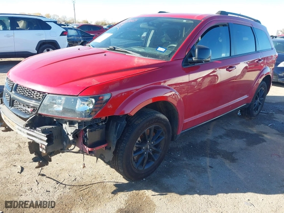 2018 Dodge Journey SXT with VIN 3C4PDCBB1JT310388, listed as a IAAI auction lot 41060665 with 128,783 mi miles. Bid and sale history available at carsss.com. Image 18.