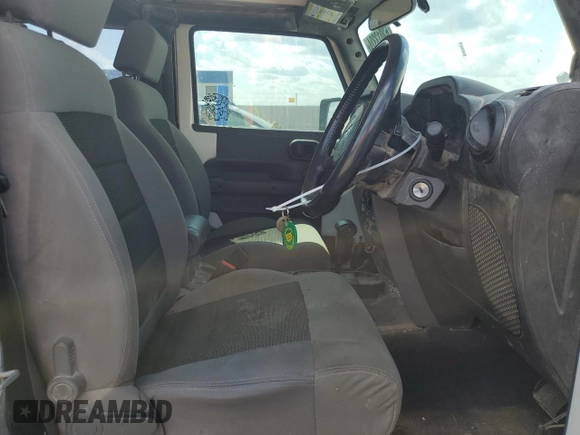 2008 Jeep Wrangler X с VIN 1J4FZ24188L503312, выставлен на аукционе Copart как лот 62013324 с пробегом 174 344 миль миль и Списание • Salvage title. История ставок и продаж доступна на DreamBid. Изображение 7.