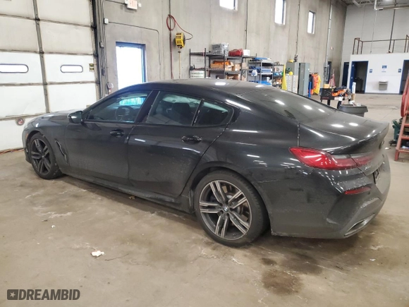 2022 BMW 8 Series 840i with VIN WBAGV4C02NCG99396, listed as a Copart auction lot 46698695 with 0 mi miles and Salvage Title. Bid and sale history available at carsss.com. Image 2.