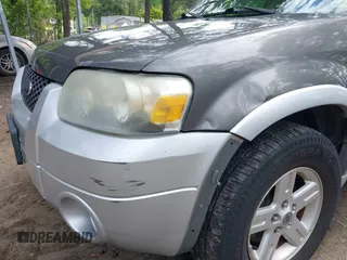 2005 Ford Escape Hybrid with VIN 1FMCU95H45KD91052, listed as a IAAI auction lot 42200393 with 304,817 mi miles and . Bid and sale history available at DreamBid. Image 6.