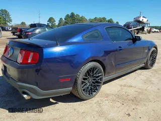 2011 Ford Mustang GT with VIN 1ZVBP8CF6B5138180, listed as a IAAI auction lot 41739427 with 131,604 mi miles. Bid and sale history available at carsss.com. Image 4.