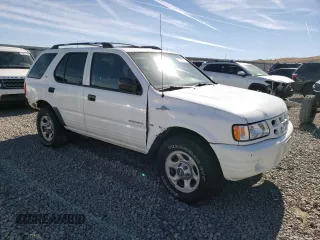 2001 Isuzu Rodeo S with VIN 4S2DM58W614343261, listed as a Copart auction lot 75365974 with Not Provided miles and Clean Title. Bid and sale history available at DreamBid. Image 4.