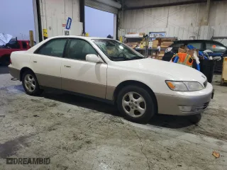 1999 Lexus ES 300 Luxury Sport Sdn with VIN JT8BF28G0X0233986, listed as a Copart auction lot 82440944 with 129,656 mi miles and Salvage Title. Bid and sale history available at carsss.com. Image 4.