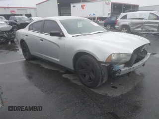 2014 Dodge Charger Police with VIN 2C3CDXAG1EH282873, listed as a IAAI auction lot 41272037 with 133,502 mi miles and . Bid and sale history available at DreamBid. Image 1.