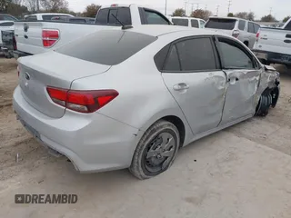 2020 Kia Rio LX with VIN 3KPA24AD4LE297180, listed as a IAAI auction lot 41498864 with 121,090 mi miles. Bid and sale history available at carsss.com. Image 4.