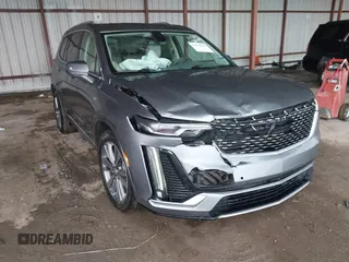 2022 Cadillac XT6 Premium Luxury with VIN 1GYKPDRS1NZ108012, listed as a IAAI auction lot 41178333 with 83,987 mi miles. Bid and sale history available at carsss.com. Image 1.