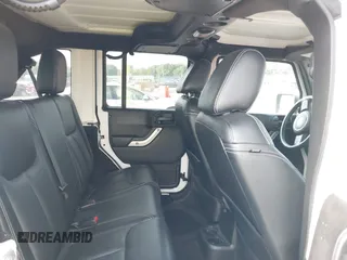 2016 Jeep Wrangler Unlimited Sahara z VIN 1C4HJWEG5GL172350, wystawiony jako IAAI lot #39987533 z przebiegiem 158 540 mil mil oraz . Historia ofert i sprzedaży dostępna na DreamBid. Obrazek 8.