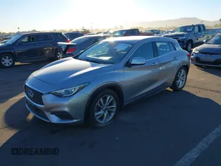 2018 Infiniti QX30 Luxury with VIN SJKCH5CPXJA057522, listed as a IAAI auction lot 41070985 with 79,007 mi miles and . Bid and sale history available at DreamBid. Image 2.