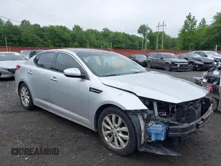 2015 Kia Optima EX z VIN 5XXGN4A76FG432554, wystawiony jako IAAI lot #42504966 z przebiegiem 58 221 mil mil oraz . Historia ofert i sprzedaży dostępna na DreamBid. Obrazek 13.