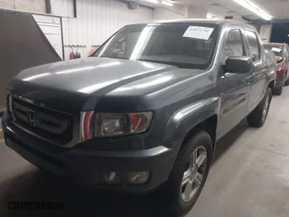 2011 Honda Ridgeline RTL with VIN 5FPYK1F57BB004189, listed as a IAAI auction lot 41871741 with 193,913 mi miles. Bid and sale history available at carsss.com. Image 17.