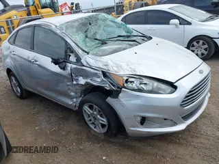 2018 Ford Fiesta SE z VIN 3FADP4BJ9JM125030, wystawiony jako IAAI lot #42041043 z przebiegiem 114 723 mil mil oraz . Historia ofert i sprzedaży dostępna na DreamBid. Obrazek 1.