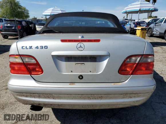 2000 Mercedes-Benz CLK 320/430 z VIN WDBLK70G8YT033575, wystawiony jako Copart lot #44710915 z przebiegiem 157 198 mil mil oraz Szkoda całkowita • Salvage title. Historia ofert i sprzedaży dostępna na DreamBid. Obrazek 6.