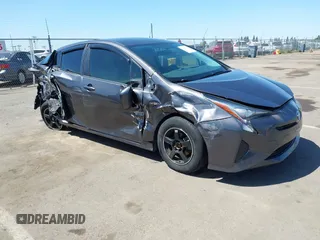 2016 Toyota Prius Two z VIN JTDKBRFU1G3521884, wystawiony jako IAAI lot #42081852 z przebiegiem 93 107 mil mil oraz . Historia ofert i sprzedaży dostępna na DreamBid. Obrazek 1.