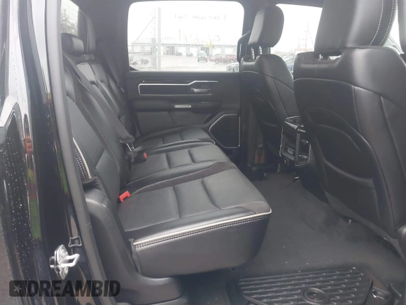 2021 Ram 1500 Laramie with VIN 1C6SRFJT6MN580803, listed as a IAAI auction lot 41207914 with 56,891 mi miles and . Bid and sale history available at DreamBid. Image 8.