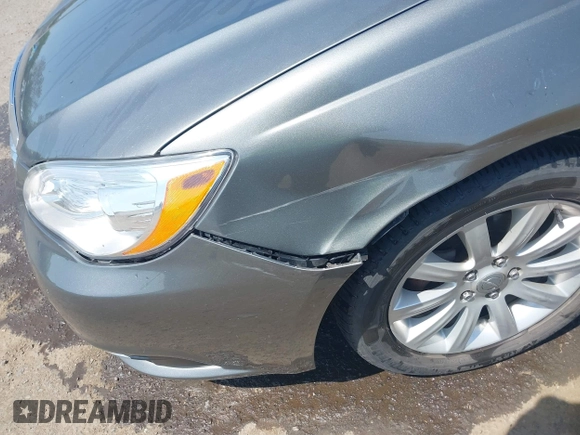 2012 Chrysler 200 Touring with VIN 1C3CCBBGXCN326023, listed as a IAAI auction lot 42126529 with 163,325 mi miles and . Bid and sale history available at carsss.com. Image 6.