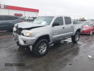 2014 Toyota Tacoma with VIN 3TMLU4EN2EM161239, listed as a IAAI auction lot 41536944 with 136,299 mi miles. Bid and sale history available at carsss.com. Image 21.