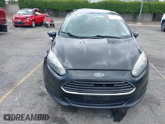 2014 Ford Fiesta SE z VIN 3FADP4BJ0EM216922, wystawiony jako IAAI lot #42255776 z przebiegiem 87 371 mil mil oraz . Historia ofert i sprzedaży dostępna na DreamBid. Obrazek 13.