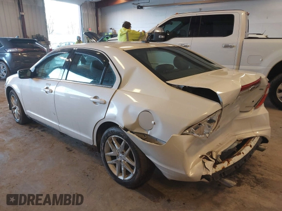 2012 Ford Fusion SEL with VIN 3FAHP0JGXCR128976, listed as a IAAI auction lot 41721468 with 115,277 mi miles. Bid and sale history available at carsss.com. Image 3.