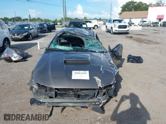 2004 Ford Mustang Standard z VIN 1FAFP40684F194867, wystawiony jako IAAI lot #39963442 z przebiegiem Nie podano mil oraz . Historia ofert i sprzedaży dostępna na DreamBid. Obrazek 6.