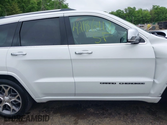 2020 Jeep Grand Cherokee Overland z VIN 1C4RJFCG9LC197401, wystawiony jako IAAI lot #42186412 z przebiegiem 64 870 mil mil oraz . Historia ofert i sprzedaży dostępna na DreamBid. Obrazek 13.
