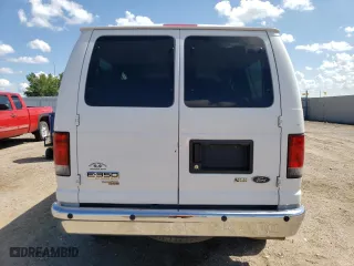 2014 Ford Econoline Wagon XL with VIN 1FBNE3BL2EDA82379, listed as a Copart auction lot 61391474 with 77,151 mi miles and Salvage Title. Bid and sale history available at carsss.com. Image 6.