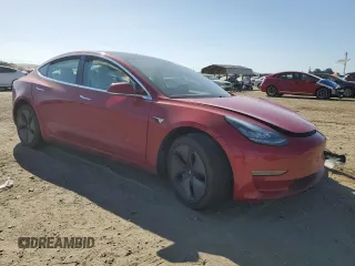 2019 Tesla Model 3 Mid Range z VIN 5YJ3E1EA3KF312453, wystawiony jako Copart lot #57841605 z przebiegiem 77 366 mil mil oraz Szkoda całkowita • Salvage title. Historia ofert i sprzedaży dostępna na DreamBid. Obrazek 4.