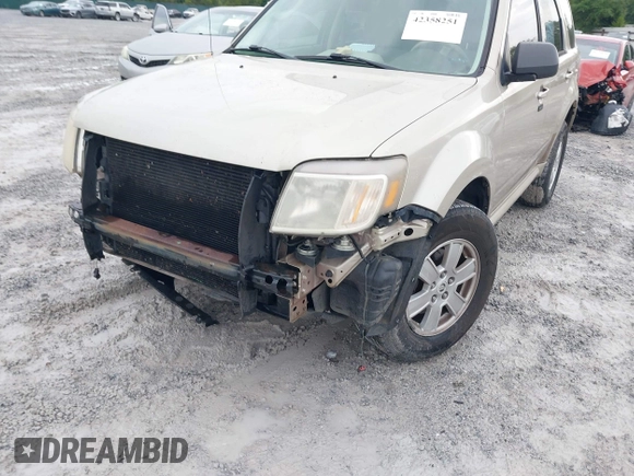 2011 Mercury Mariner z VIN 4M2CN8B72BKJ03915, wystawiony jako IAAI lot #42358251 z przebiegiem 169 206 mil mil oraz . Historia ofert i sprzedaży dostępna na DreamBid. Obrazek 6.