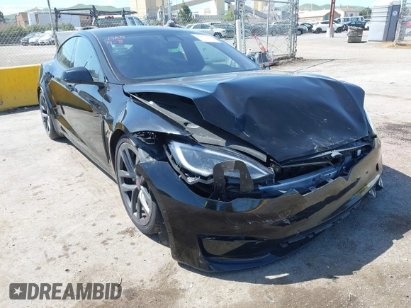 2022 Tesla Model S Plaid with VIN 5YJSA1E61NF483354, listed as a IAAI auction lot 41973636 with 32,541 mi miles and . Bid and sale history available at DreamBid. Image 6.