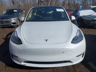 2024 Tesla Model Y Performance with VIN 7SAYGDEF3RA281969, listed as a IAAI auction lot 41680674 with 22,615 mi miles and . Bid and sale history available at DreamBid. Image 12.