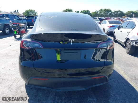 2024 Tesla Model Y with VIN 7SAYGDED2RA331436, listed as a IAAI auction lot 41713562 with NaN miles. Bid and sale history available at carsss.com. Image 16.