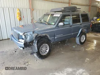1998 Jeep Cherokee with VIN 1J4FT78S8WL252502, listed as a Copart auction lot 59664545 with 133,148 mi miles and Salvage title. Bid and sale history available at DreamBid. Image 1.