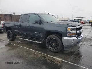 2019 Chevrolet Silverado 1500 LT with VIN 2GCRCPEC4K1125424, listed as a Copart auction lot 56191625 with 54,461 mi miles and Salvage Title. Bid and sale history available at DreamBid. Image 4.