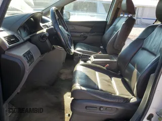 2013 Honda Odyssey Touring with VIN 5FNRL5H90DB003003, listed as a Copart auction lot 58519345 with 259,383 mi miles and Salvage title. Bid and sale history available at DreamBid. Image 7.