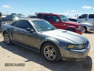 2001 Ford Mustang Deluxe z VIN 1FAFP44431F253084, wystawiony jako IAAI lot #42098457 z przebiegiem Nie podano mil oraz . Historia ofert i sprzedaży dostępna na DreamBid. Obrazek 1.