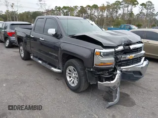 2016 Chevrolet Silverado 1500 LT with VIN 1GCRCREC7GZ109079, listed as a IAAI auction lot 40985730 with 162,630 mi miles and . Bid and sale history available at DreamBid. Image 1.