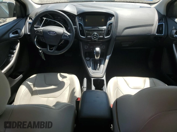 2017 Ford Focus Titanium с VIN 1FADP3N2XHL287713, выставлен на аукционе Copart как лот 57823155 с пробегом 51 828 миль миль и Списание • Salvage title. История ставок и продаж доступна на DreamBid. Изображение 8.