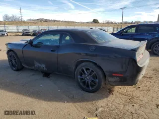 2021 Dodge Challenger GT with VIN 2C3CDZKG3MH677579, listed as a Copart auction lot 41977525 with 65,597 mi miles and Salvage Title. Bid and sale history available at carsss.com. Image 2.