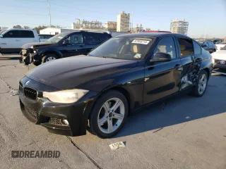 2015 BMW 3 Series 328i with VIN WBA3A5C5XFF610800, listed as a Copart auction lot 82969214 with 113,508 mi miles and Salvage title. Bid and sale history available at DreamBid. Image 1.