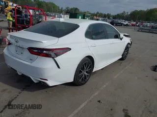 2022 Toyota Camry SE with VIN 4T1G11AK6NU066677, listed as a IAAI auction lot 41892982 with 71,059 mi miles and . Bid and sale history available at carsss.com. Image 4.