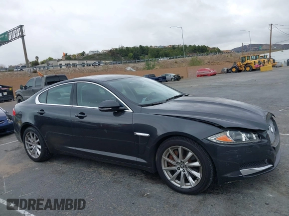 2013 Jaguar XF I4 RWD with VIN SAJWA0ES0DPS64027, listed as a IAAI auction lot 41569121 with 103,115 mi miles. Bid and sale history available at carsss.com. Image 13.